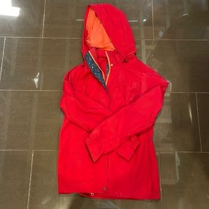 Red windbreaker